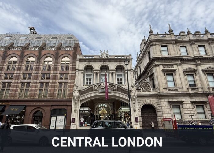 Historic Central London buildings and street scene with traffic in the foreground