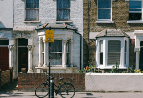 Traditional terraced houses with bay windows and small front gardens