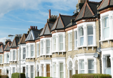 Row of period terraced houses with bay windows in Hammersmith, London
